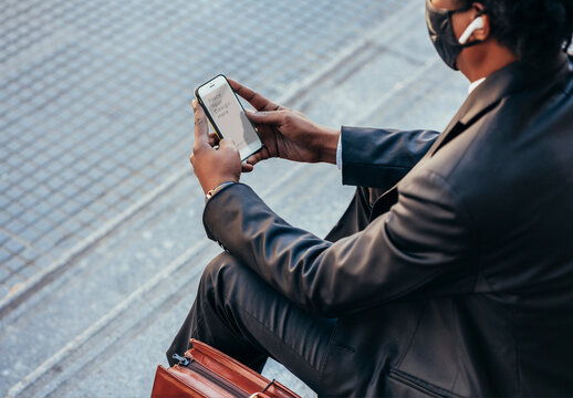 Businessman with a Mobile Screen Mockup