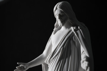 Close Up of Christus Statue With Dramatic Lighting