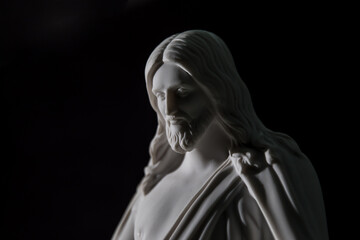 Fototapeta na wymiar Close Up of Christus Statue With Dramatic Lighting