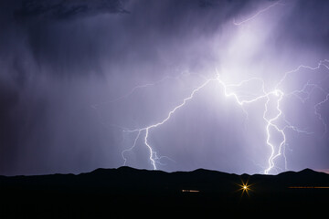Lightning storm over a mountain