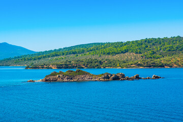 Beautiful Mediterranean landscape with Aegean sea and green hills