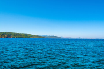 Beautiful Mediterranean landscape with Aegean sea and green hills