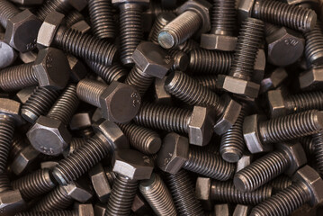 Steel bolts background. Used in carpentry and handicrafts for industrial and household.