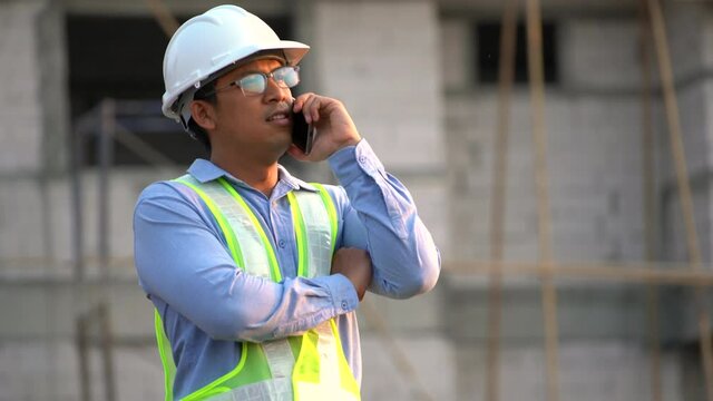 Civil engineer inspection building and calling on site  