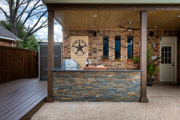 Modern outdoor kitchen that has been freshly built - 407334448