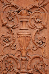 Fototapeta na wymiar Detail of ornate exterior wall decoration on old building