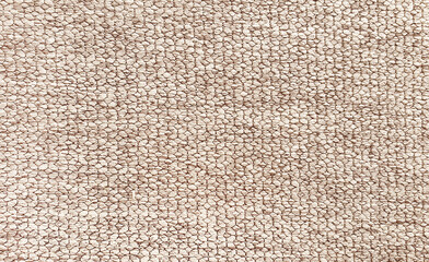 close up of beige plain yarn fabric sample for interior drapery or upholstery work. canvas...