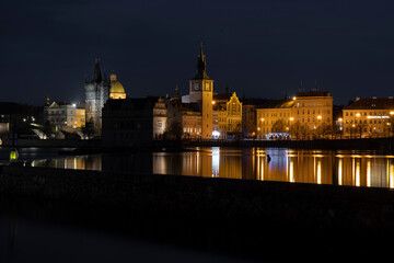 Fototapeta na wymiar .Vltava river near Charles bridge at night in January 2021