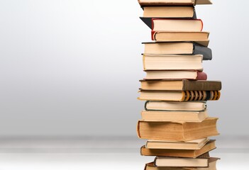 Collection stack of old retro books on background