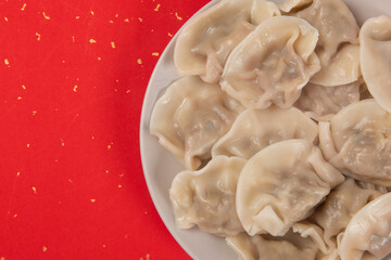 Chinese New Year dumpling background.Blessing and treasure.