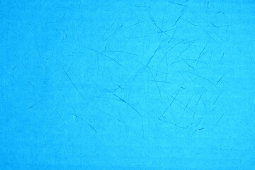 Colored cardboard damaged by cuts from various activities