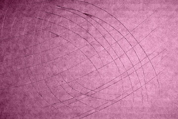 Colored cardboard damaged by cuts from various activities