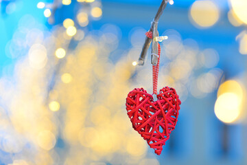 red heart on a blue-blue background with bokeh. valentines day background