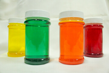 Bottles filled with colorful liquids