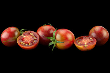 Brown cherry tomatoes on white