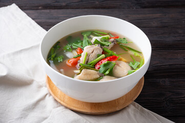 Thai Spicy chicken clear soup , tom yum kai,