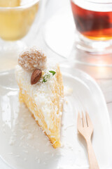 Slice Of Coconut Cake With Afternoon Tea