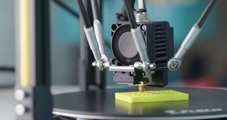 3D Printing Machine printing a piece of plastic