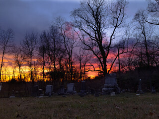salmon sunset over cemetery
