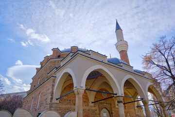 Old ancient ottoman architectural building of Banya Bashi Mosque and its minaret center of the...