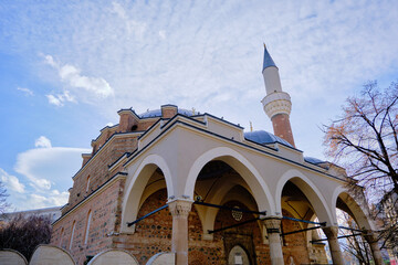 Old ancient ottoman architectural building of Banya Bashi Mosque and its minaret center of the...