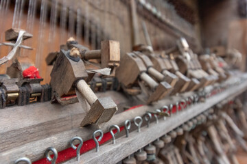 detail close up of old broken piano parts