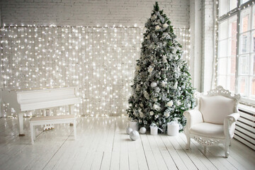 Christmas tree in interior with white colors lights and boken