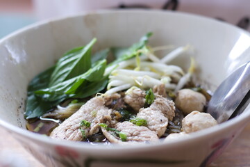 Thai noodles with pork in blood soup.