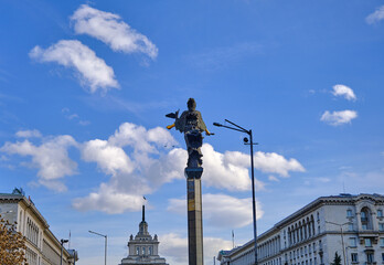 Fototapeta na wymiar Saint Sofia Monument in Sofia with governmental and old Former Bulgarian Communist Party Headquarters background with blue sky. Bulgaria. Sofia. 06.01.2021