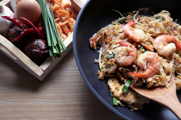 Pad thai , Stir fry noodles with shrimp and vegetables.