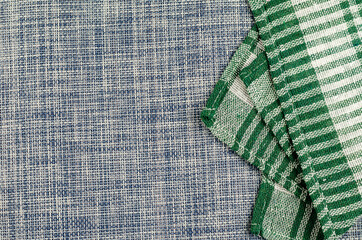 Green checkered blue denim cloth napkin.