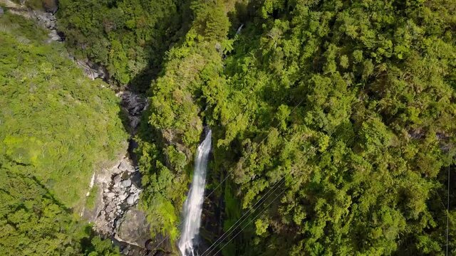 Bird's Eye View Of Waterfalls And Green Lush Vegetation Surrounding Sagada, Mountain Province, Philippines - aerial drone shot