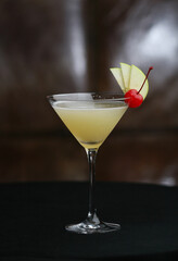 A Glass of Cocktail by a Bonfire at Night