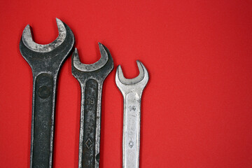 A set of wrenches of different sizes.