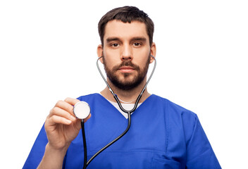 healthcare, profession and medicine concept - doctor or male nurse in blue uniform with stethoscope...