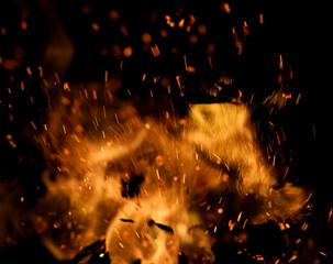 fire flame with sparks on black background