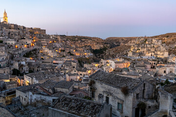 Naklejka premium View of the Sassi di Matera a historic district in the city of Matera, well-known for their ancient cave dwellings. Basilicata. Italy