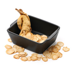 Chinese Herbal medicine - American Ginseng slices (Panax quinquefolius) isolated on white background