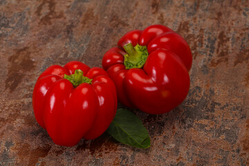 Ripe Red bell pepper over wooden