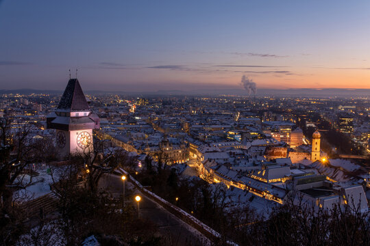 Graz, Austria - January 11, 2021: View on the old town during sunset in the winter