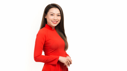 Vietnamese girl wear traditional long dress Ao Dai isolated on white background