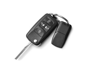 Modern car flip key with trinket isolated on white, top view