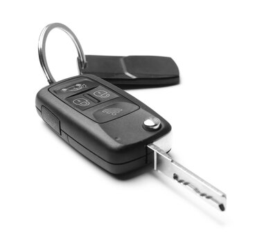 Modern car flip key with trinket isolated on white