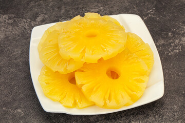 Marinated pineapple rings in the bowl