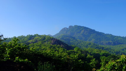 Fototapeta na wymiar Beautiful View Of Gunung Sepikul In The Morning Located In Sukoharjo, Indonesia.