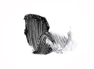 Black mascara brush strokes isolated on white