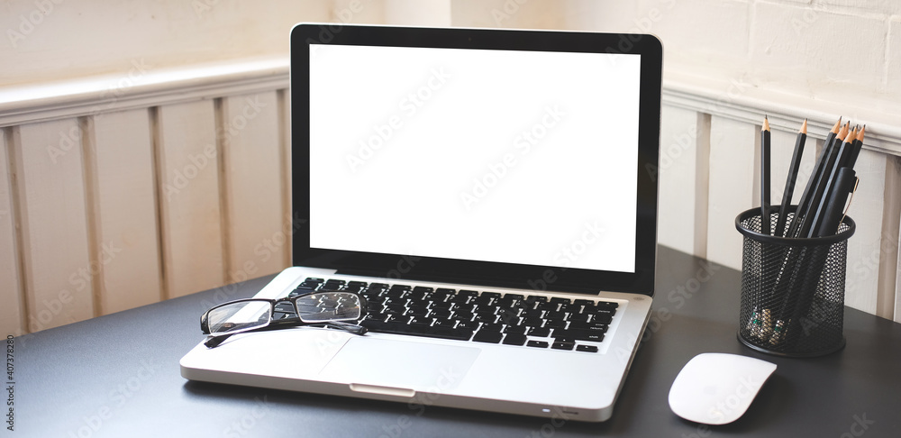 Wall mural modern workspace with computer with blank screen and equipment on white table.blank screen for your 