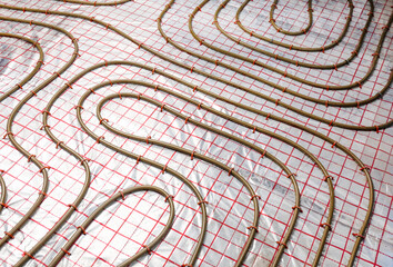 Installation of underfloor heating system in building