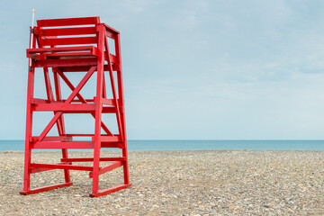 Tower for the lifeguard on the beach by the sea, no people