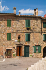 Residential building in the historic centre of the medieval town of Monticiano in Siena Province, Tuscany, Italy
